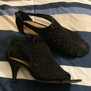 Fun black heel (about 1-1/2”), hardly worn